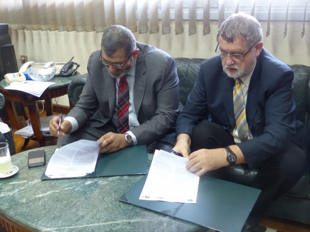Dr. Wehenpohl and Dr. El Zahabi while signing the agreement
